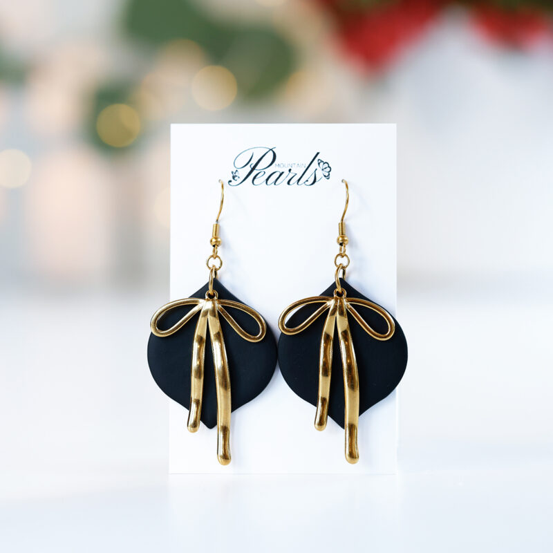 Viseči črni uhani z zlato mašnico